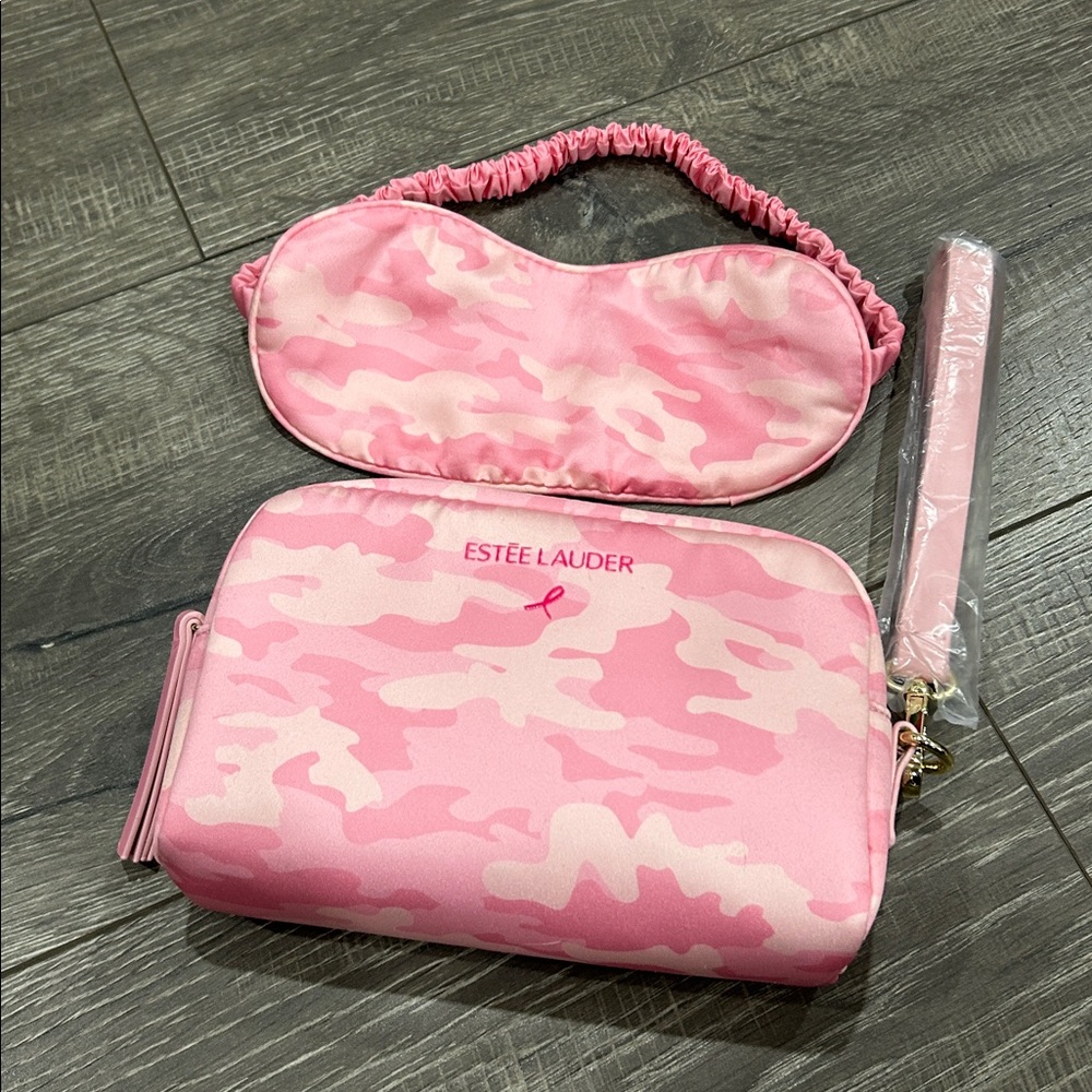 Estee Lauder Cosmetic wristlet bag with eye sleep mask